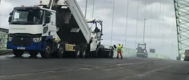 Asphalt onto a Bridge