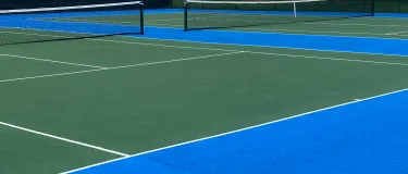 The finished tennis court at Wolf Fields in Southall