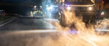 Roller flattening fresh asphalt on the A90 at Cramond Bridge