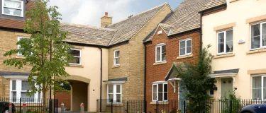 Collection of attached housing, paving and road