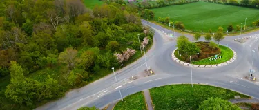 SuperCurve asphalt used on a roundabout with trees and a field