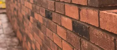 A picture of a brick and mortar wall
