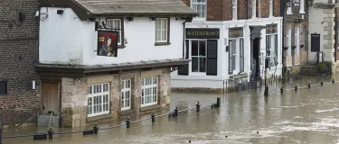 Typical UK town with it's main-street flooded up to the top of railings