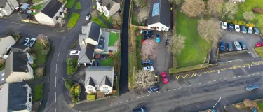 Ariel shot of Waterhouses village with the postoffice, school and newly laid path