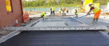 PPE workers working concrete