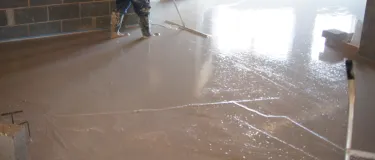 Highflow screed being installed at Beaumont Hall