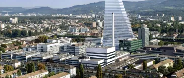 drone image of Roche Tower highrise building over the city