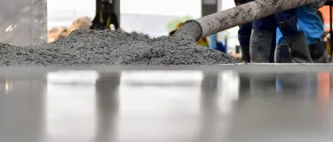 Concrete piped in from construction site