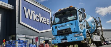 A Holcim Concrete2You blue mixedr truck outside the Wickes store in Wigston, Leicestershire to mark a new partnershhip between C2Y and Wickes.