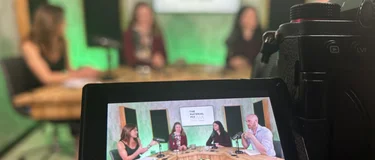 A close up of the camera filming guests in the studio of Holcim's Material Mix podcast