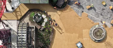 An aerial view of contractors laying Holcim's Supercolour Ultra Buff at Paulton Park new Valgard- Realm of the Vikings area