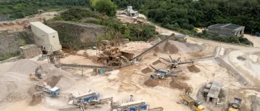An aerial shot of Moorcroft Quarry in Plymouth including solar panels on the maintenance workshop roof.