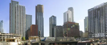 person running along a dock front at wood wharf