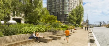 Wood Wharf project in London along waterfront with runners