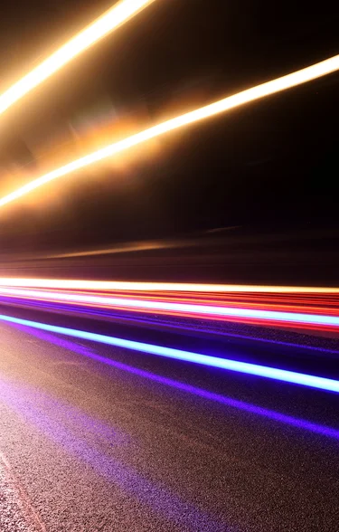 The M5 motorway at night with vehicle lights in the distance