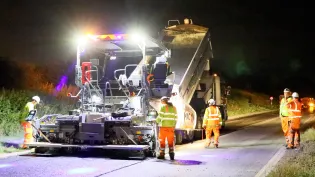 A46 being laid at night with workers