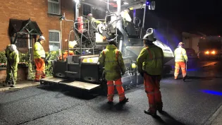 An Aggregate Industries paver laying an asphalt with the Gipave additive as part of a trail with Milestone and Oxfordshire County Council
