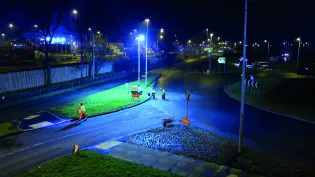 SuperCurve being used at a roundabout at night with workers