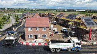 Warm mix asphalt in place of standard Tarmac on building site