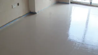 Screed floor poured in a house