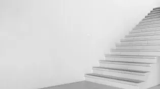 White concrete stairs and wall