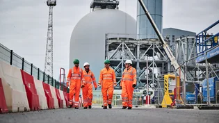 Members of the Holcim UK Tilbury team walking on site in PPE