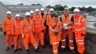 Representatives from Aggregate Industries, Regerco and Aniron after the completion of a new solar panel installation project at Hulland Ward