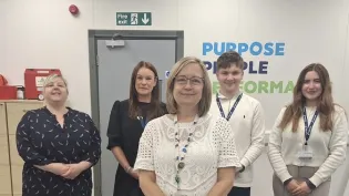 Office Manager Liz Jones with her team in the offices at High Roads