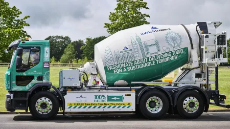 A side on view of an electrically powered concrete mixer with London Concrete branding on. It will be the first e-mixer to operate in London.