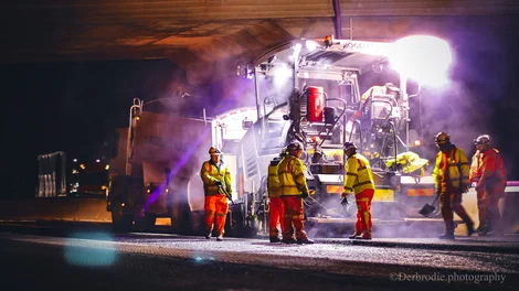 Construction workers resurfacing the M1 motorway at Junction 13.
