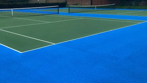 A view of the finished SuperSport Tennis court at Wolf Fields