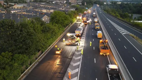 Aggregate Industries vehicles on the M65 in Lancashire laying the new low carbon Foamix product as part of trials with Lancashire County Council