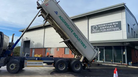 A tipper truck depositing SuperCurve asphalt into the carpark at Northern Asphalt