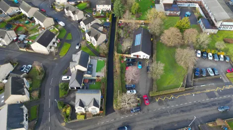 Ariel shot of Waterhouses village with the postoffice, school and newly laid path