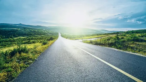 Road through open fields