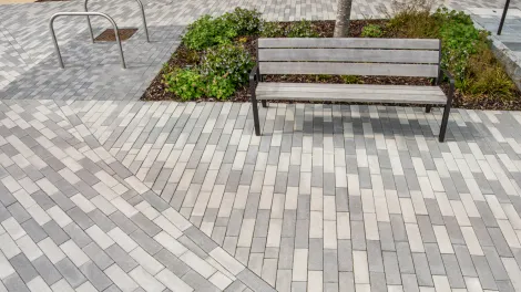 Stonemaster Infilta in Light Grey and Dark Grey, North West Cambridge with bench