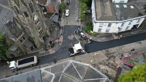 A road in Leicester being milled and planed ready for resurfacing by Aggregate Industries