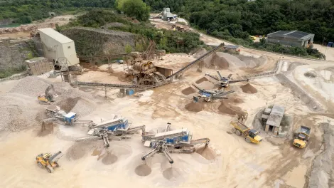 An aerial shot of Moorcroft Quarry in Plymouth including solar panels on the maintenance workshop roof.