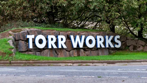 The front entrance sign for Holcim UK's Torr Works 