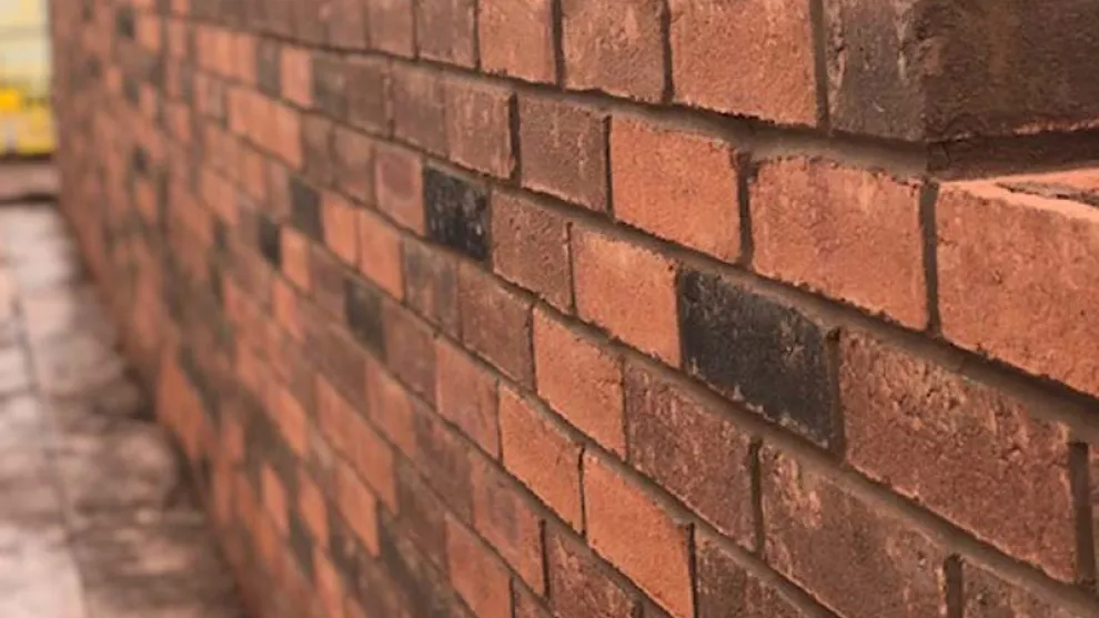 A picture of a brick and mortar wall