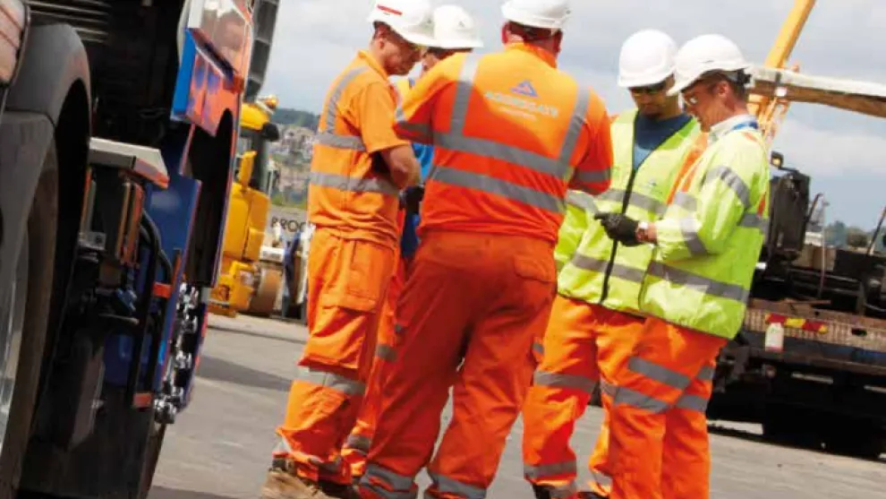 Quality Policy, men on site wearing high viz