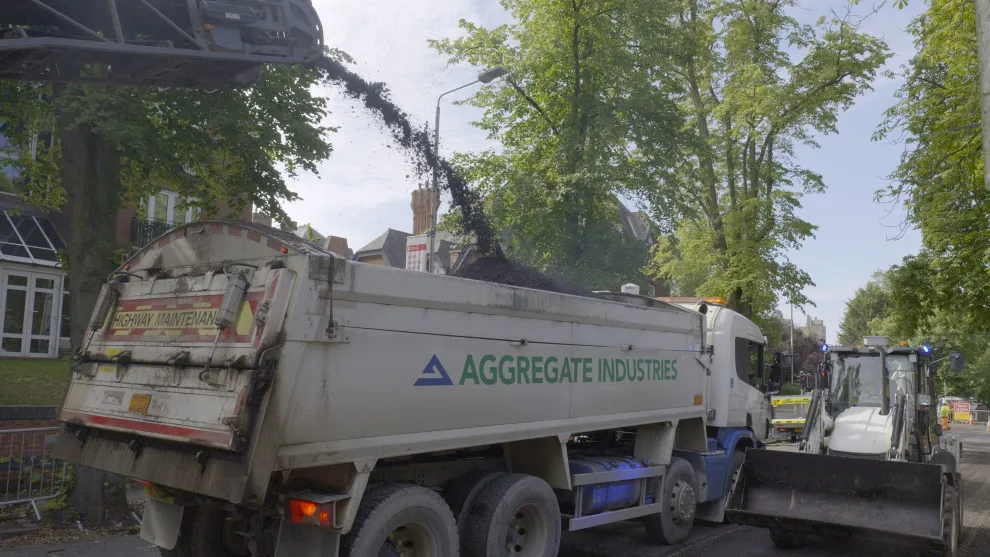 Planned asphalt ejecting into an Aggregate Industries tipper truck