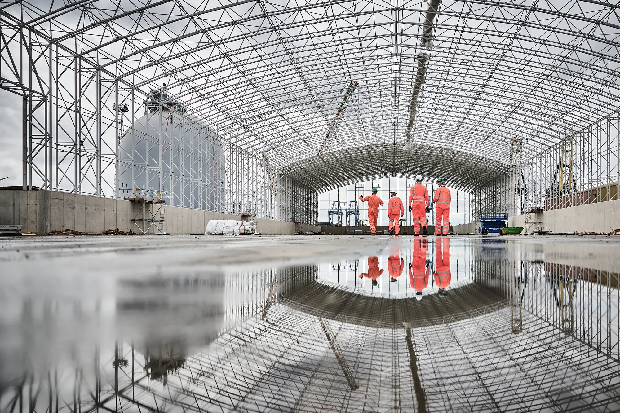 Inside a large warehouse that's under construction