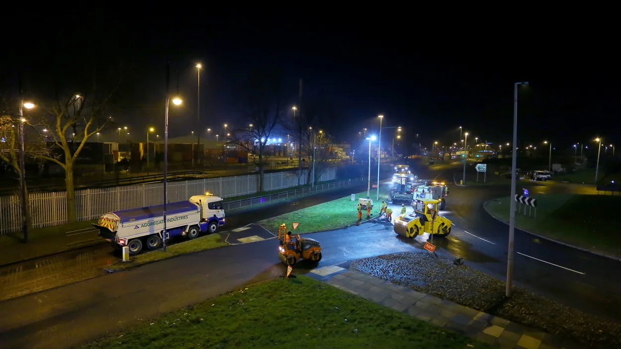A roundabout with SuperCurve being laid at night