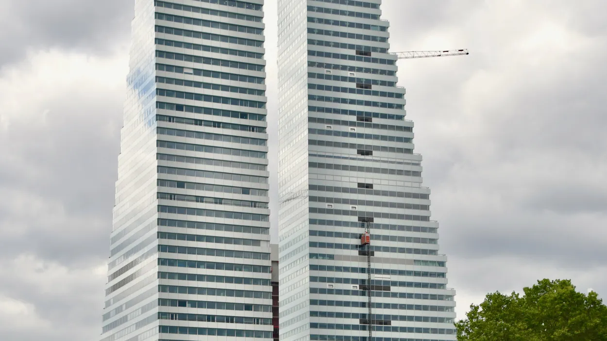 Roche Tower highrise on a cloudy day from the ground