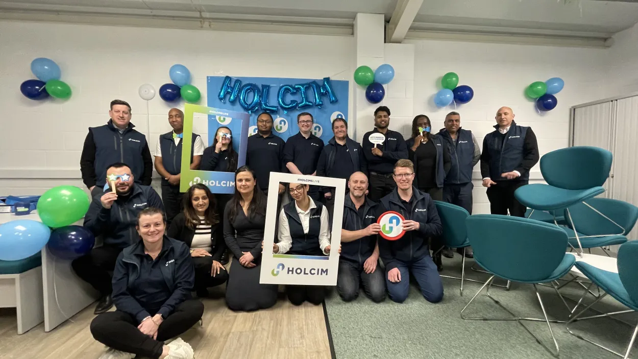 Kelly Lowe with colleagues during Holcim's rebrand in the UK