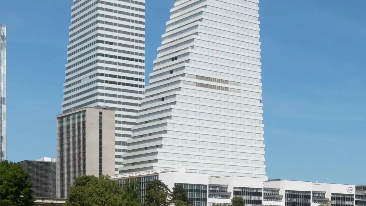 The Roche Tower highrise image taken from over the water