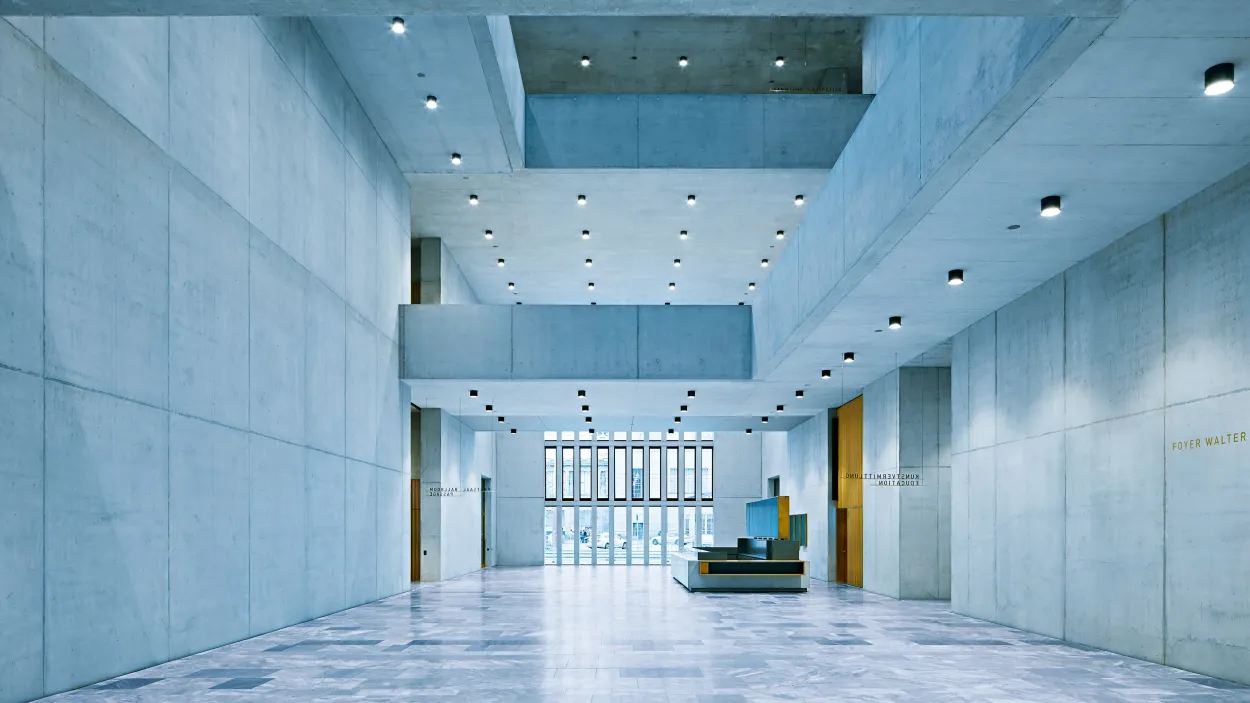 Lobby of the Kunsthaus building in Zurich with a blue hue