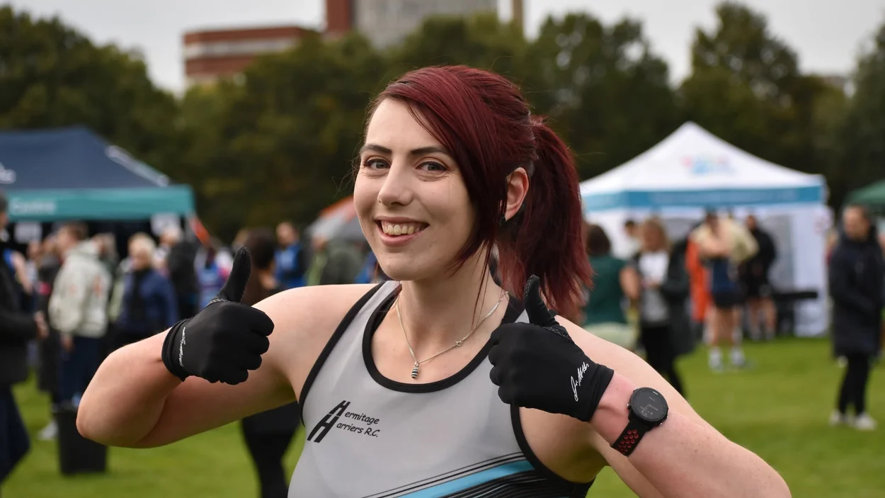 Danielle Dawson, Cement Technical Innovation Manager, in her running gear giving a thumbs up