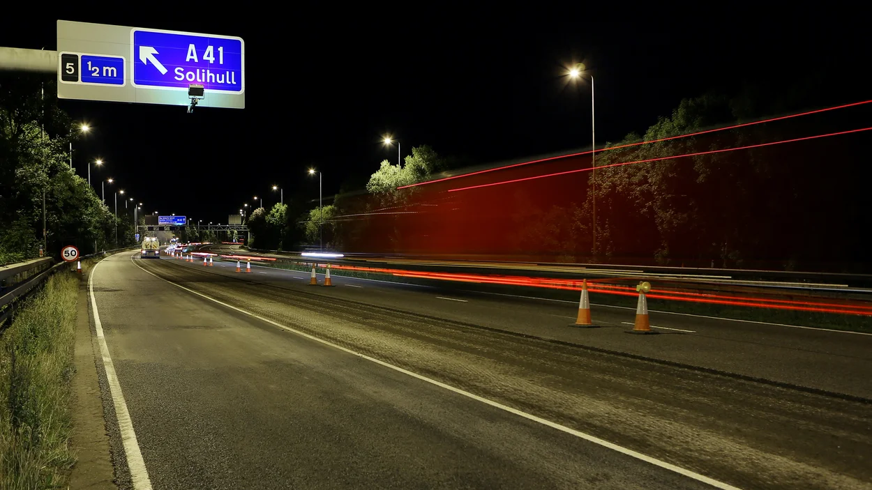 Part of th4e3 M42 motorwqay junction 6 at night being resurfaced by Holcim
